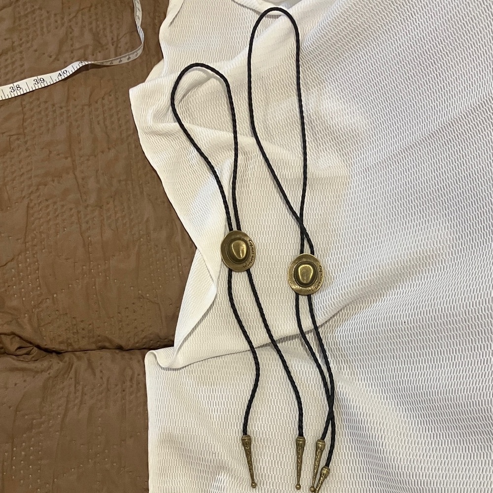 Classic Western Bolo Tie with Gold and Black Design